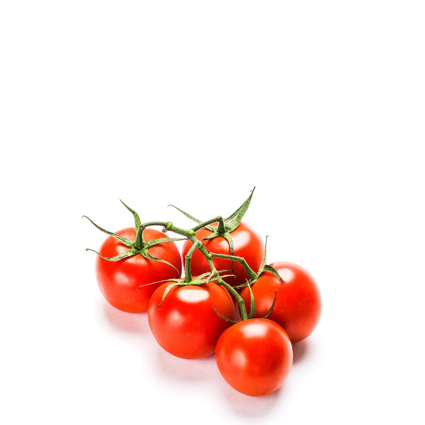 Organic Tomatoes On The Vine